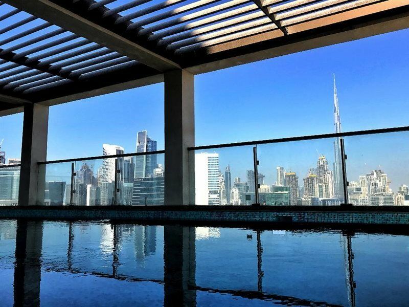 Millennium Atria Business Bay Aparthotel Дубай Екстериор снимка View from the rooftop pool